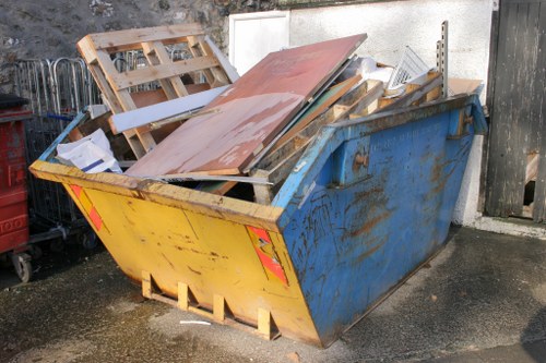 Cluttered attic before clearance